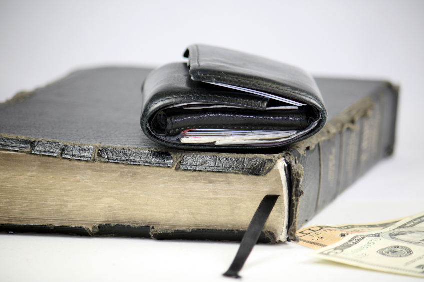 wallet sitting on bible