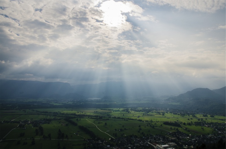 corpuscular rays over landscape