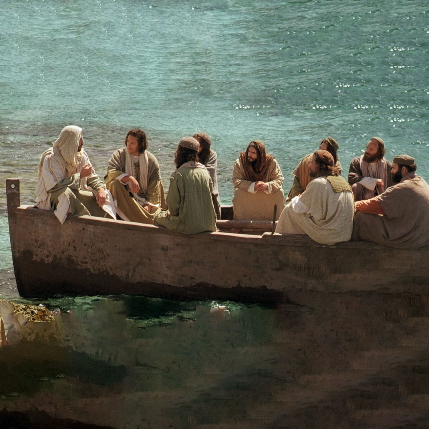 Jesus is teaching his disciples in a fishing boat